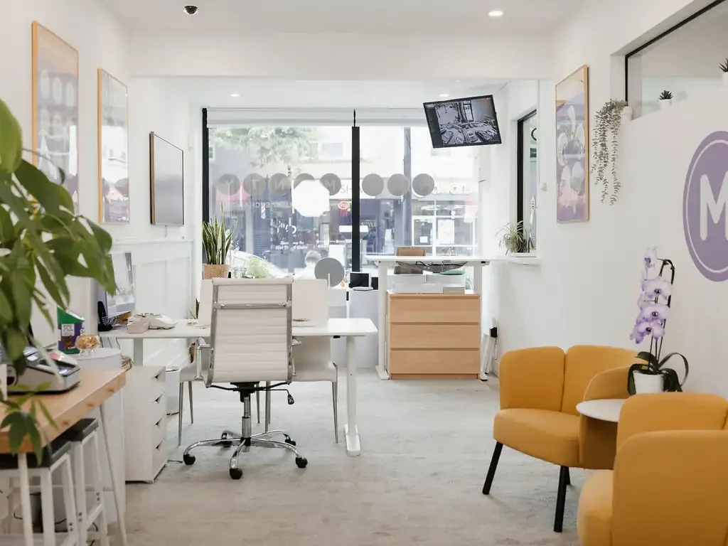 The bright MINTY shop in Burlington, looking from the client lounge toward the front windows