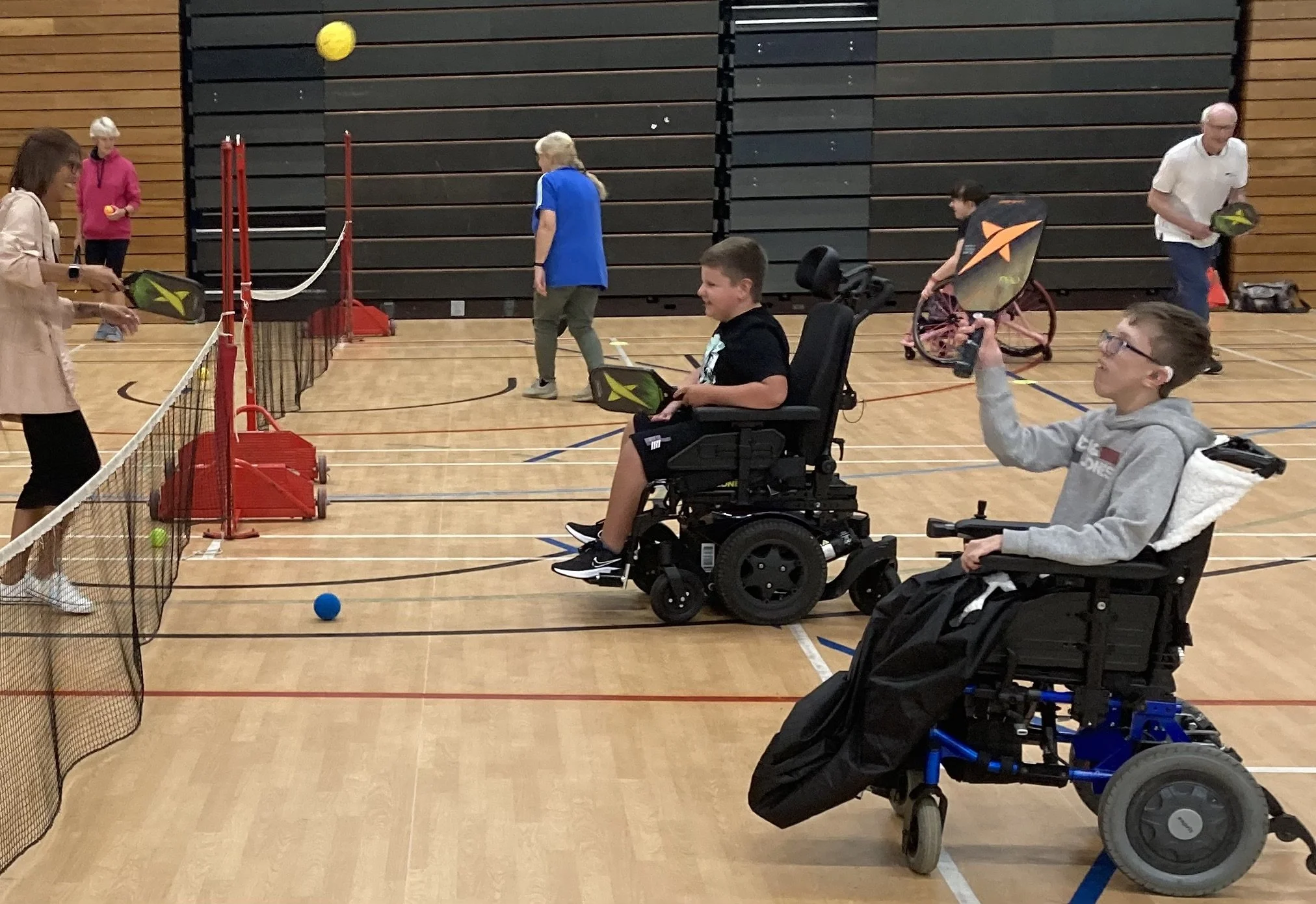 A wheelchair player taking part in a Frenz pickleball session