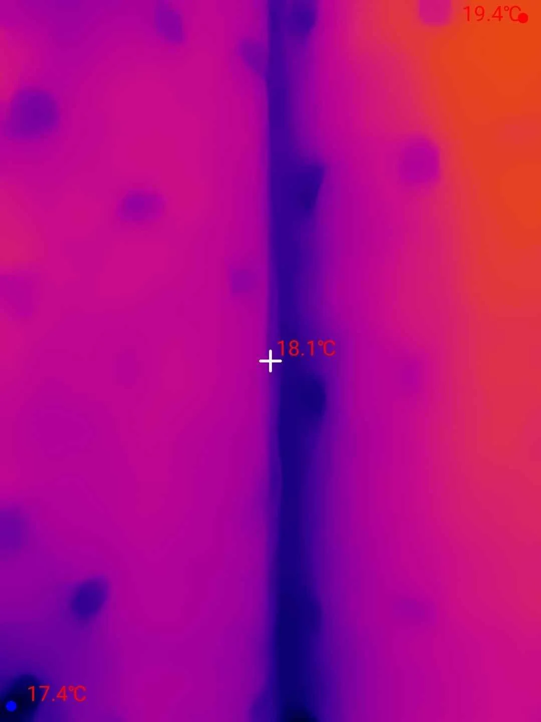 Thermal image showing apparent surface-temperature variation across a wall.