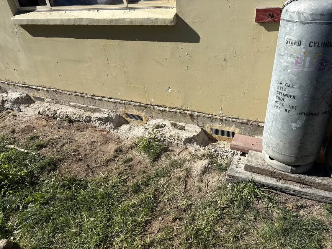 New subfloor vents installed in the external wall of a Coffs Harbour home, subfloor ventilation upgrade after assessment