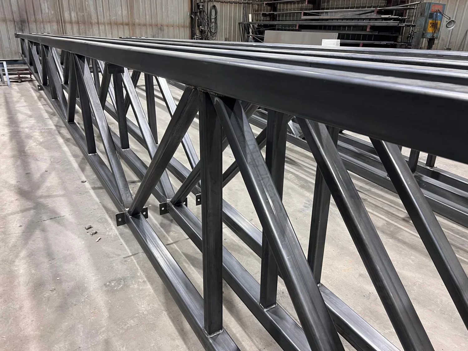 Finished painted steel truss frame