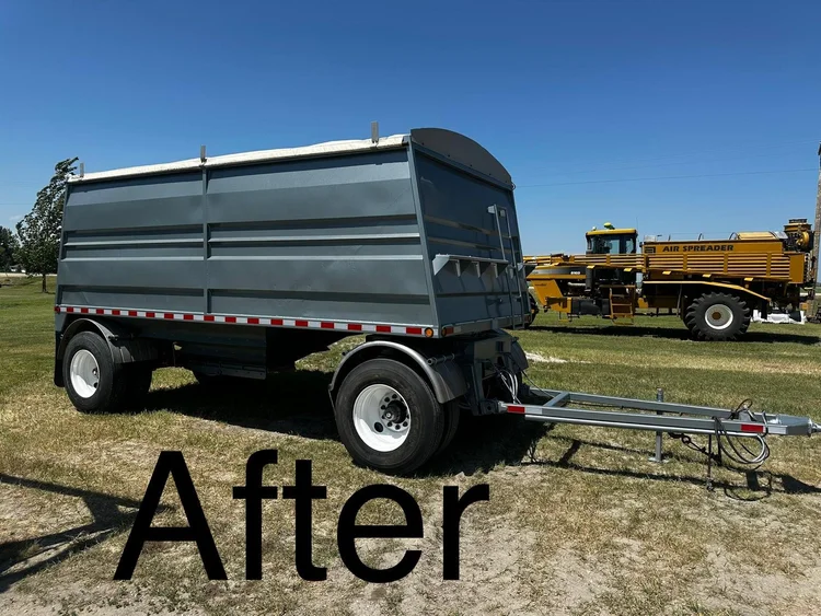 Agricultural grain dump trailer with fresh dark grey paint