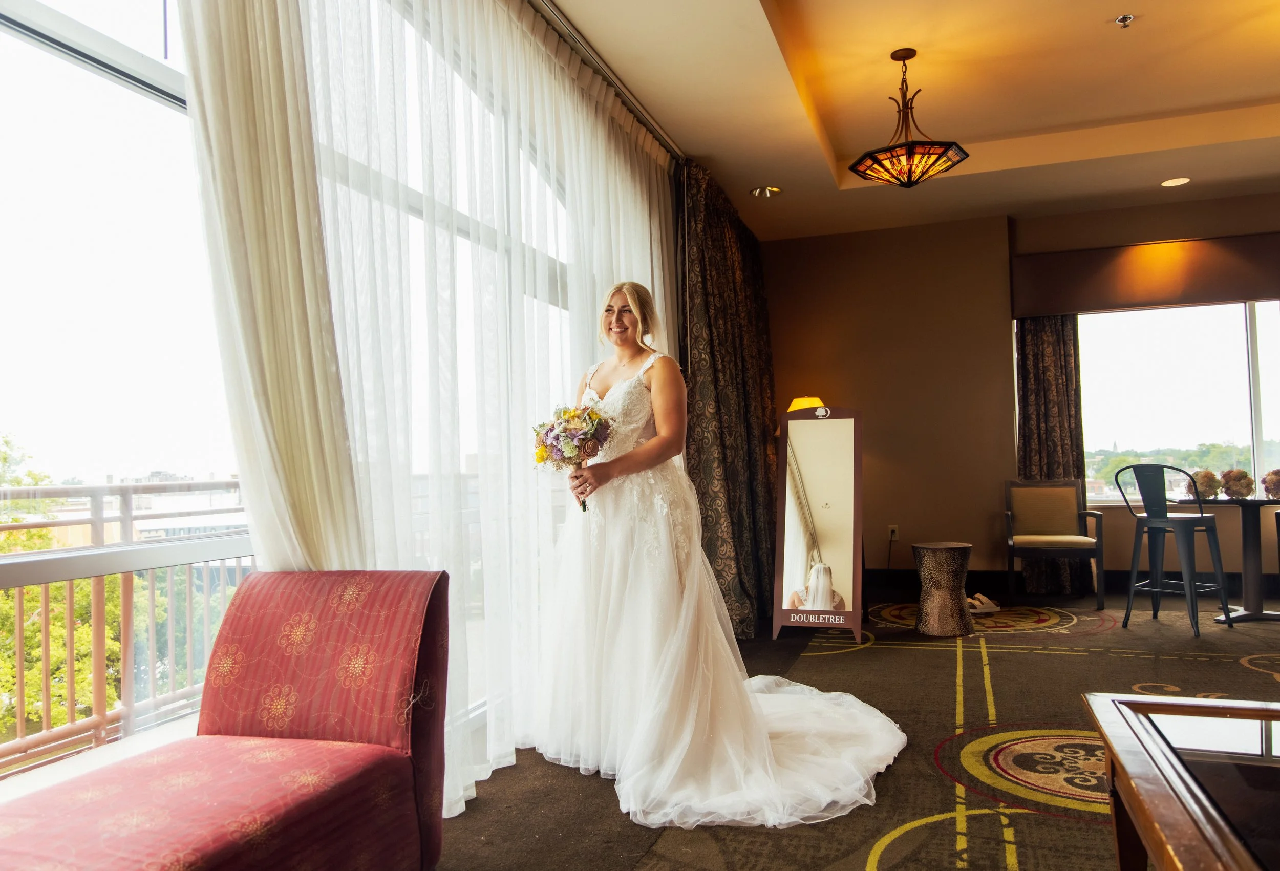 Noah and Jenna together at the DoubleTree Hotel wedding in Bay City