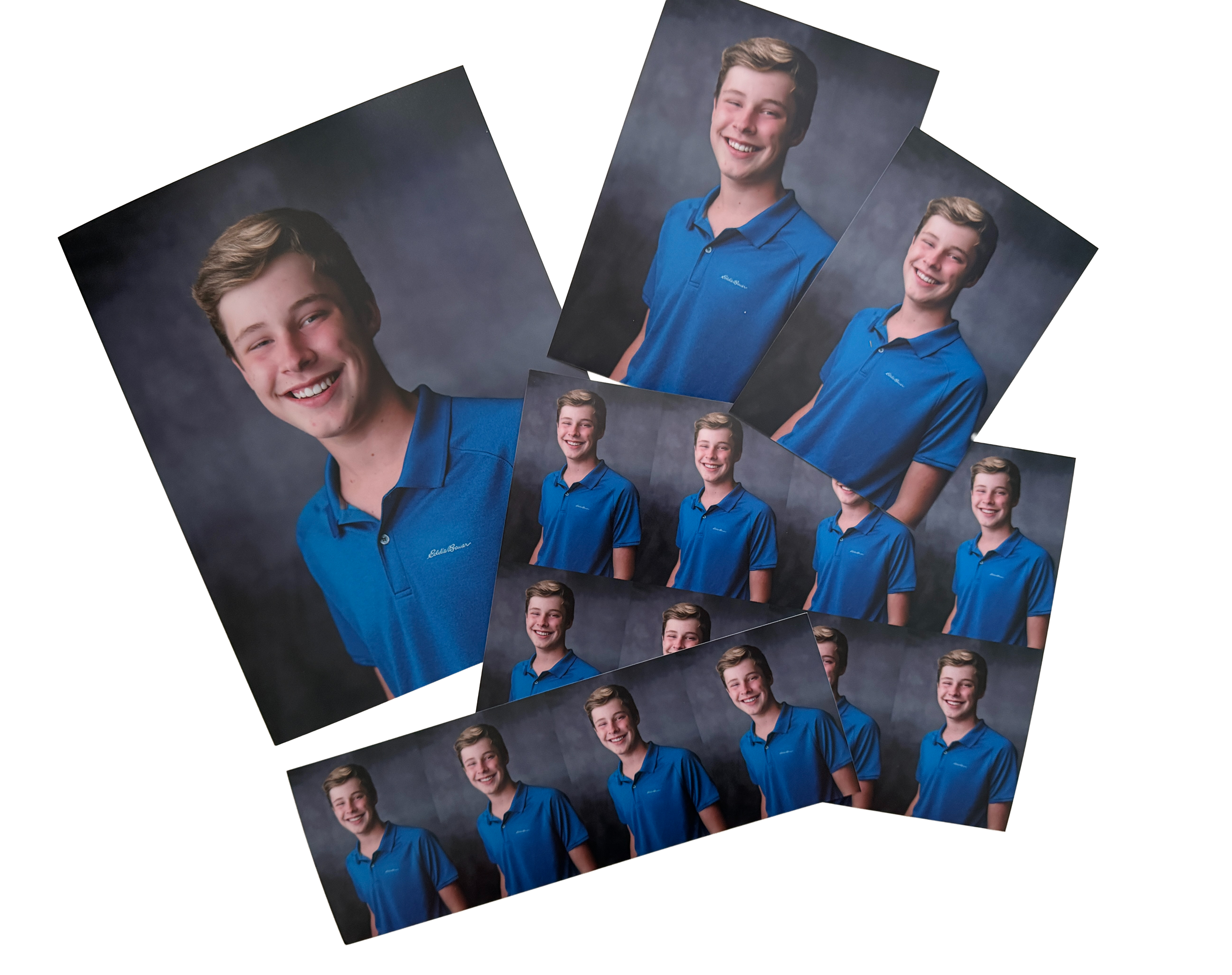 Collection of printed school portraits in several sizes.