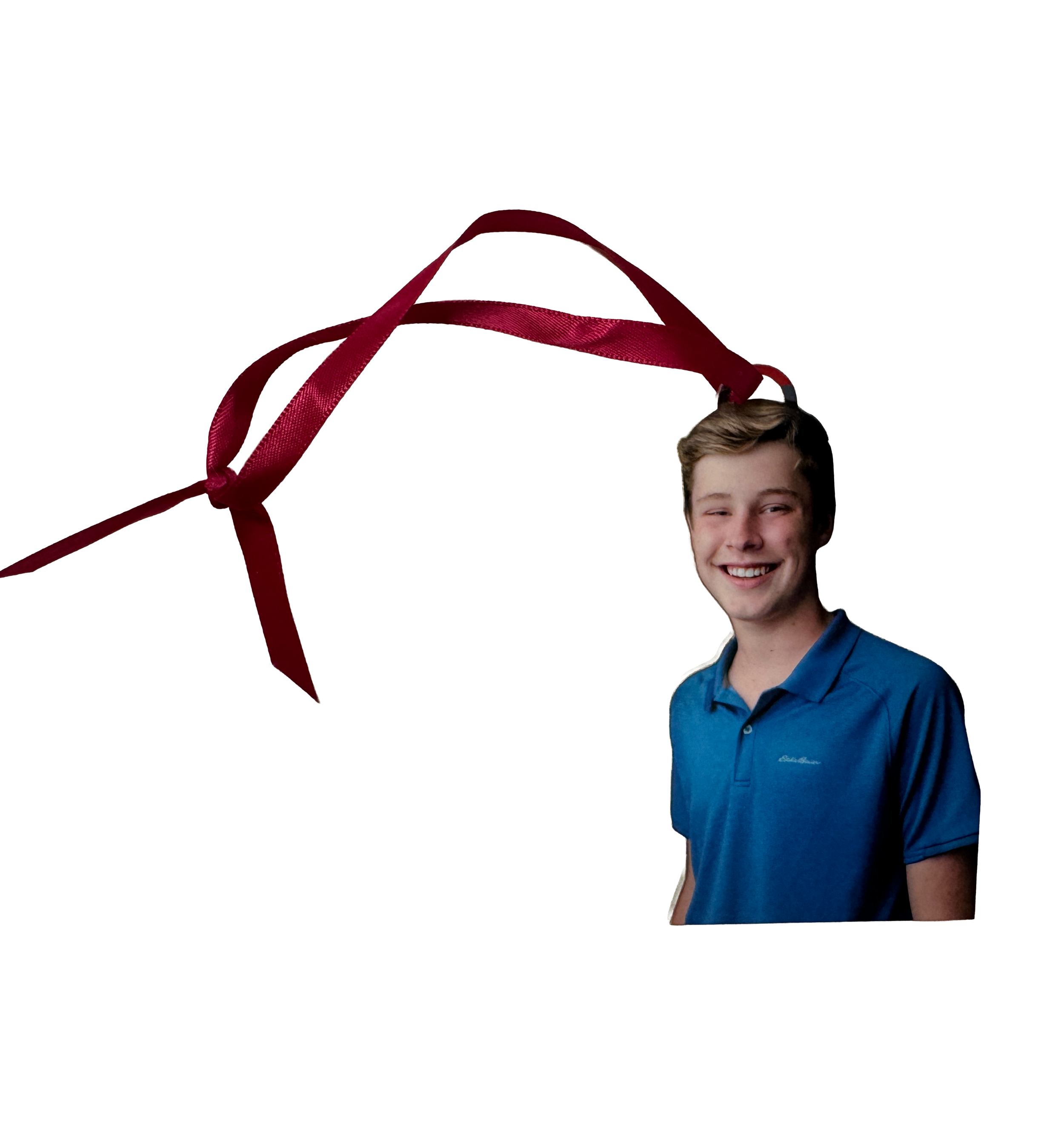 Acrylic cutout ornament of a student with a red ribbon.