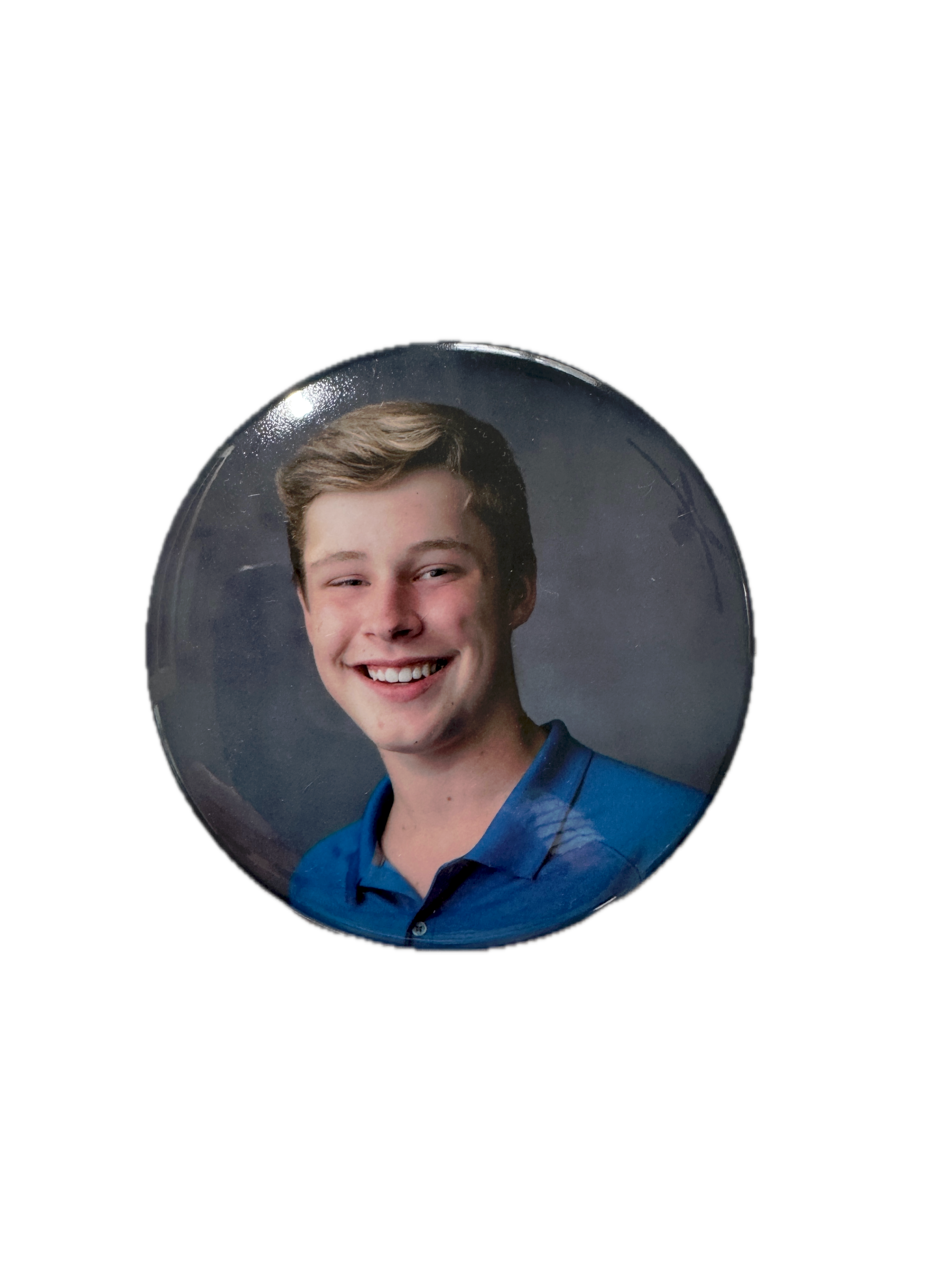 Round photo button with a student portrait.
