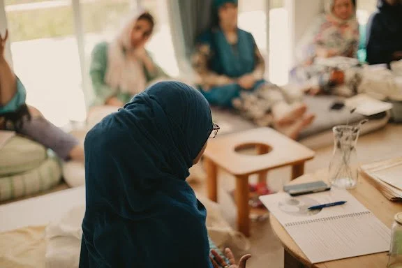 Women gathered in a healing circle