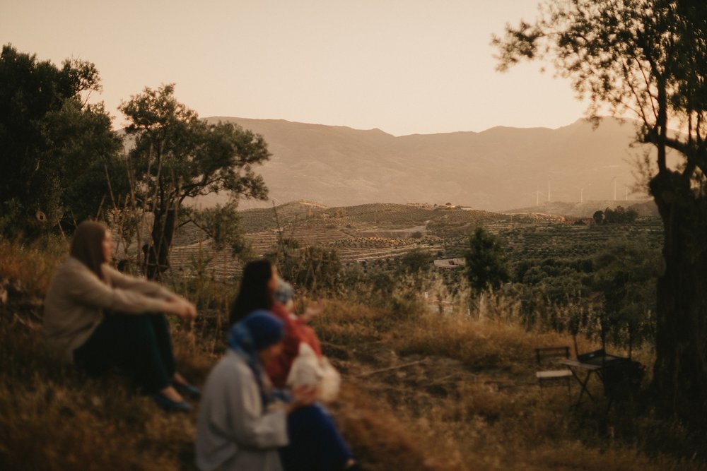 Women resting on a hillside