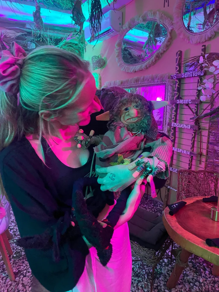 Andie holding Avion Alux at the bistro