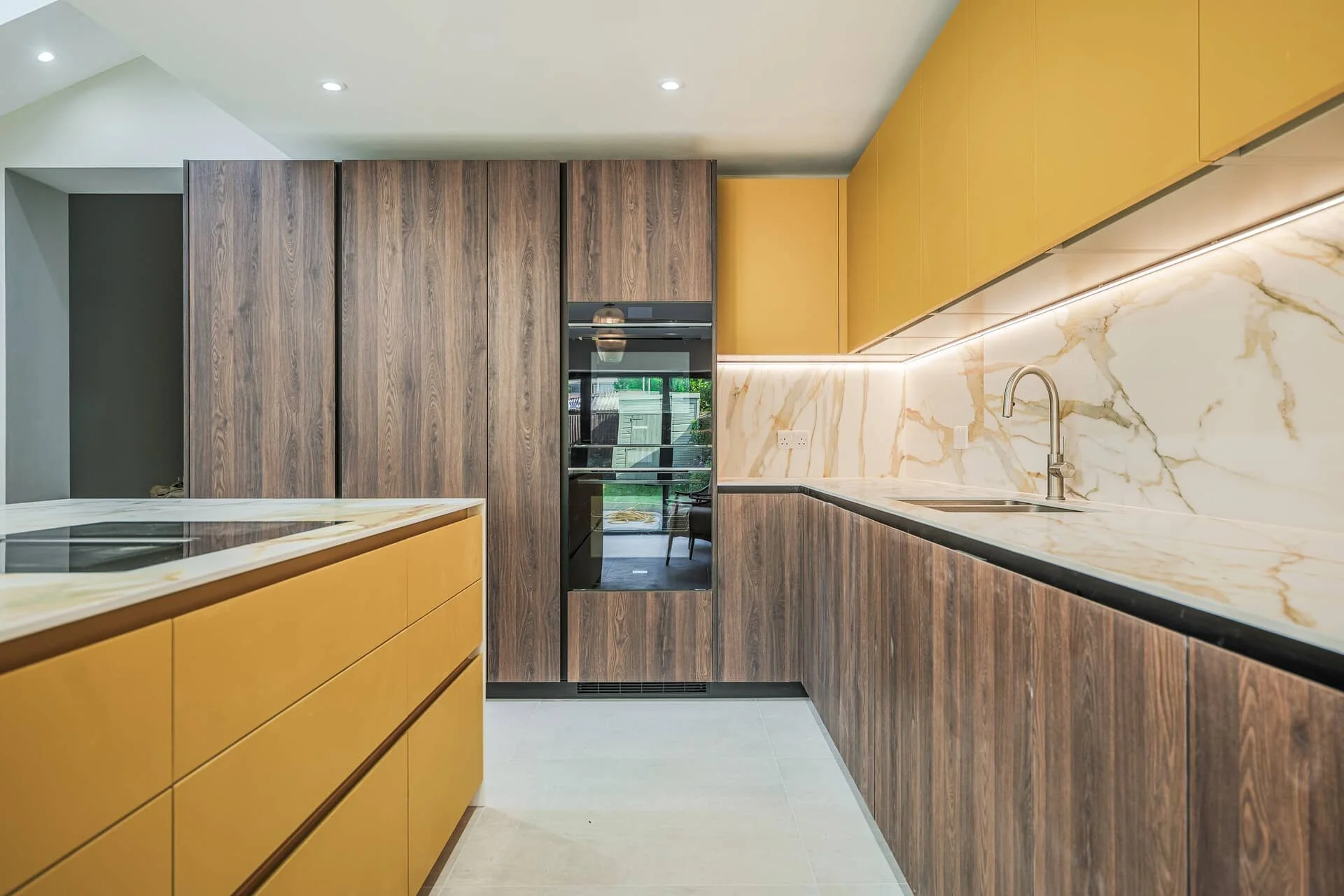 TODO: describe this kitchen, e.g. handleless oak kitchen with open shelving and integrated lighting