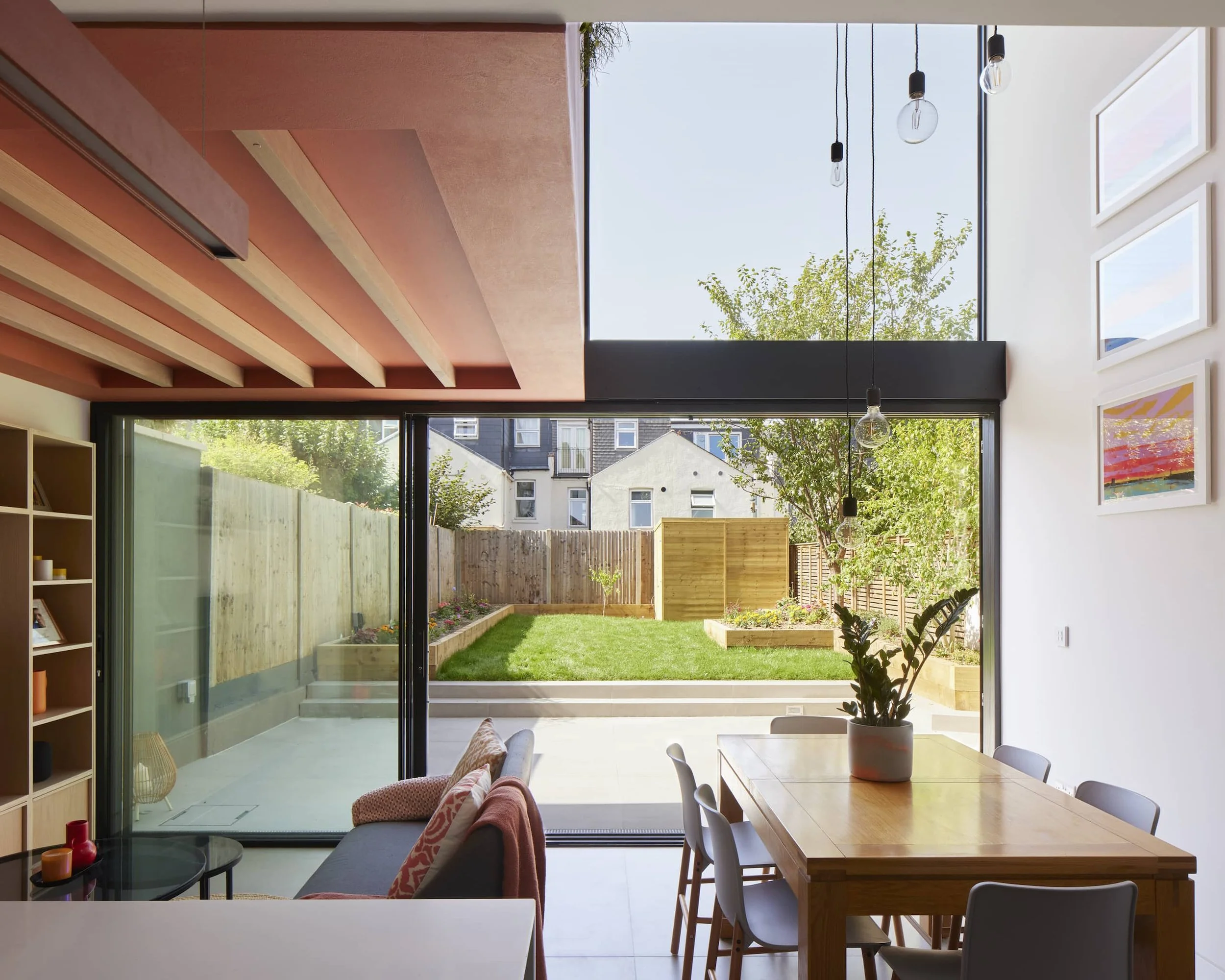 Open-plan kitchen extension with island and dining area.