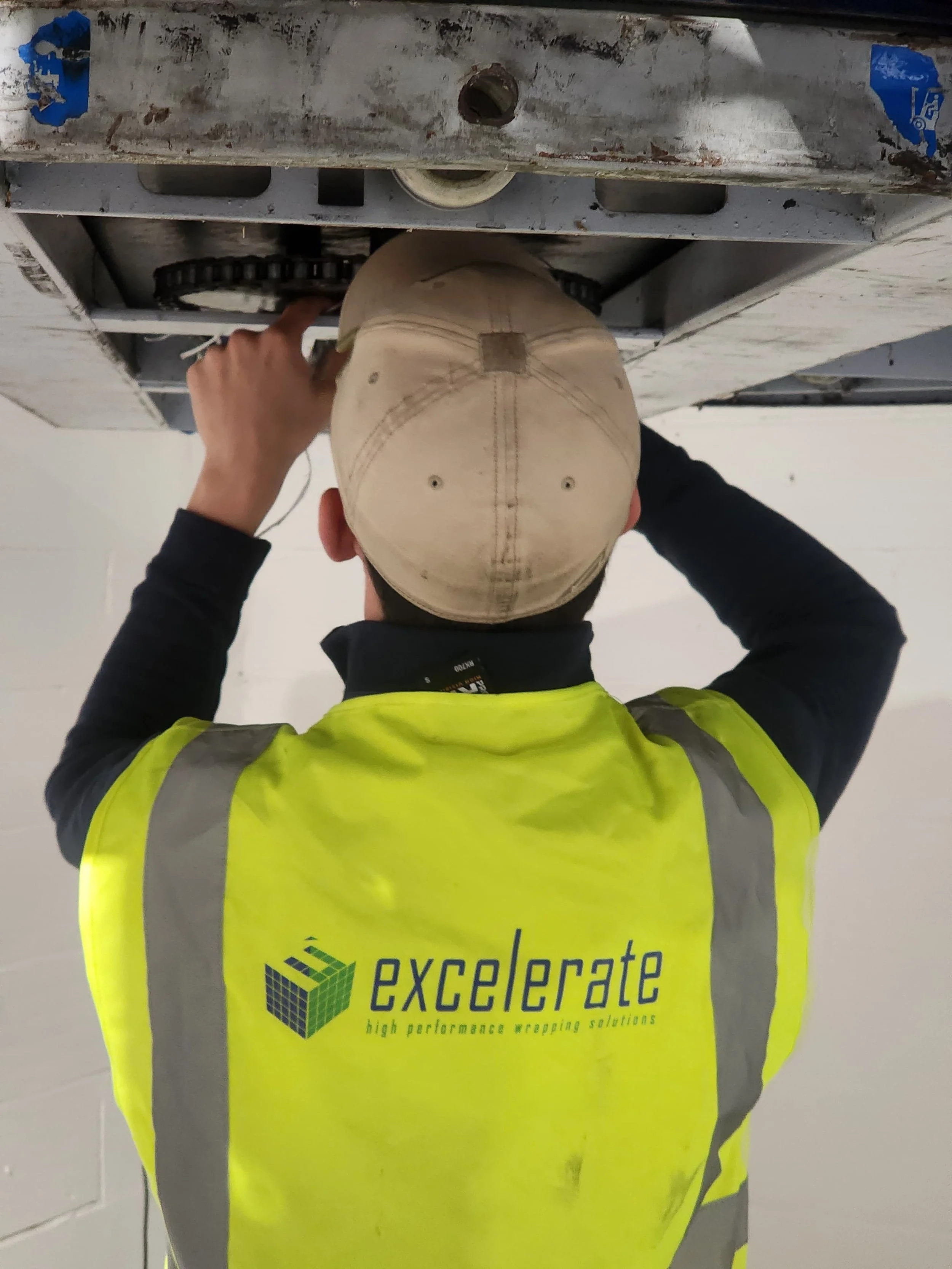 Excelerate engineer investigating pallet wrapper fault