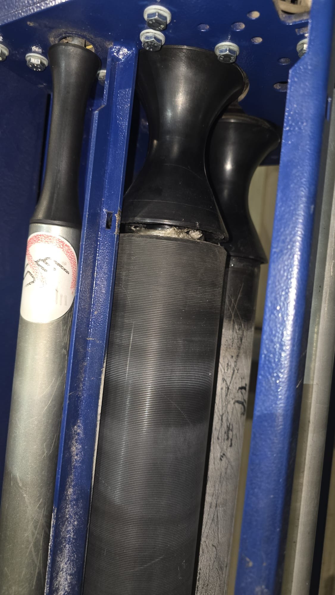 Engineer inspecting pallet wrapper carriage fault