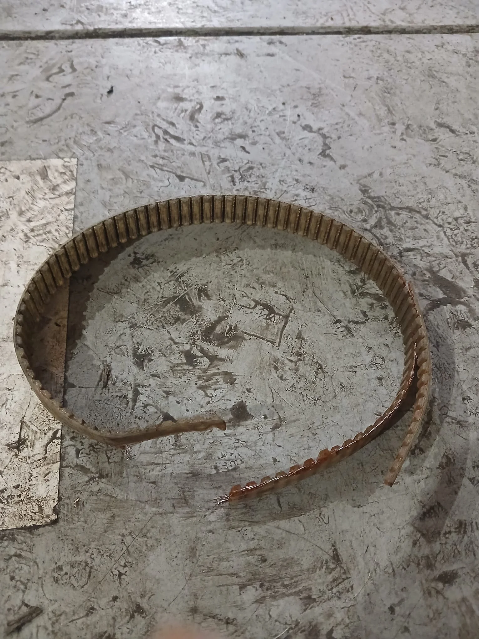 Broken drive belt on pallet wrapper