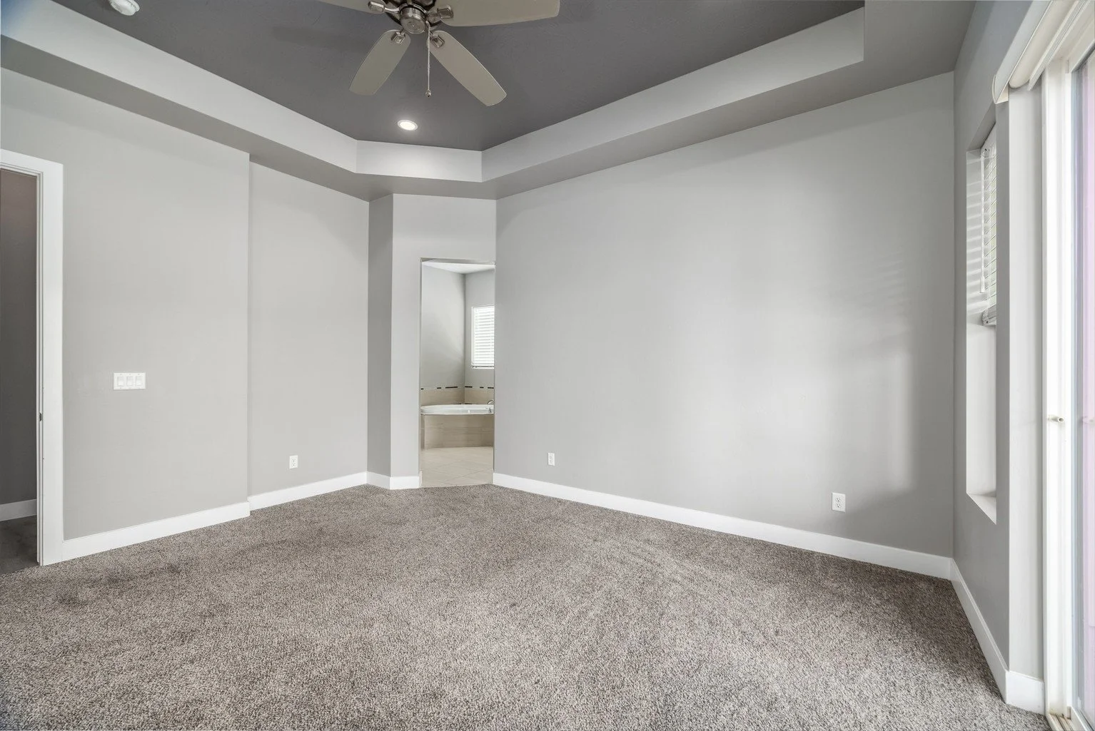 Original empty primary bedroom photographed by Sam Reed