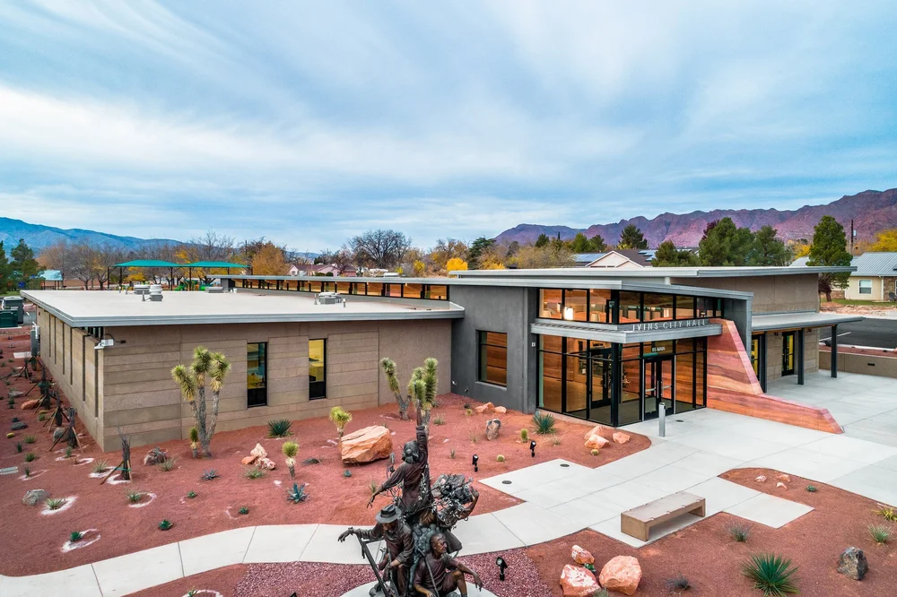 Elevated view of Ivins City Hall and its landscaped plaza with sculpture.