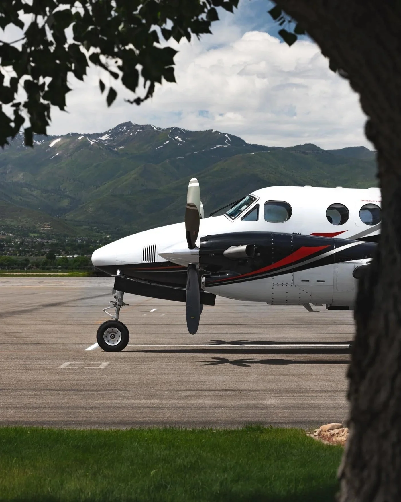 King Air in front of mountains