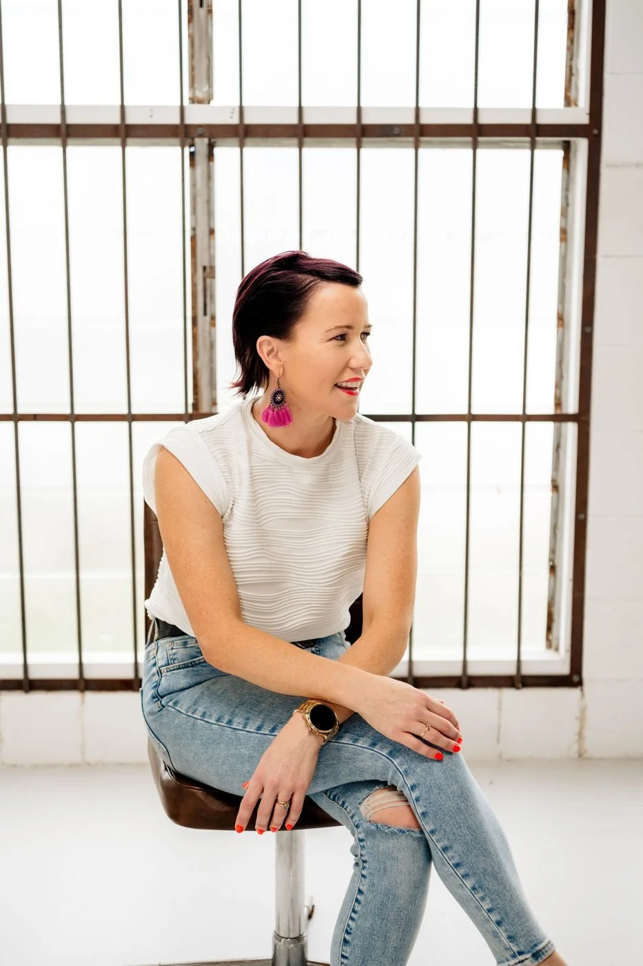 Laura Campbell seated in a bright studio