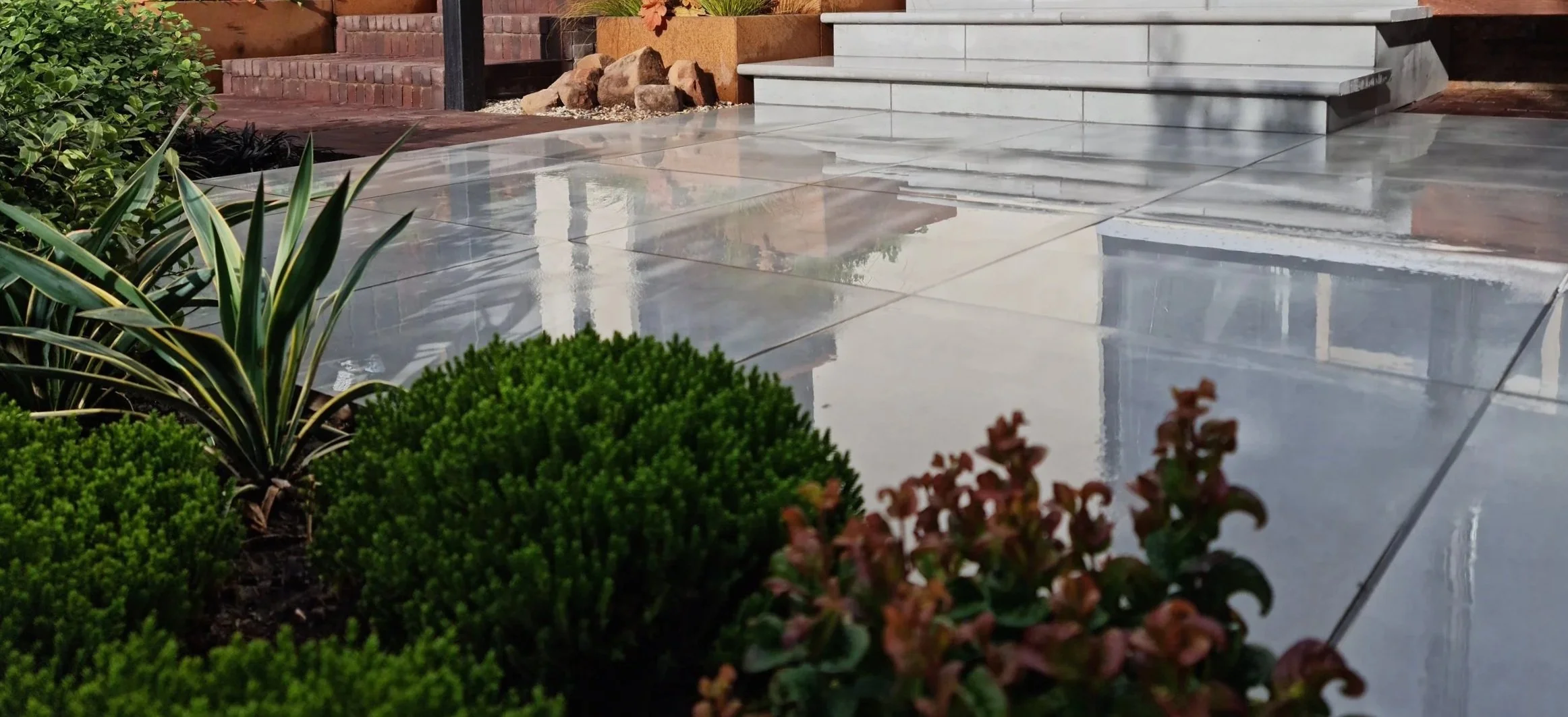 Detailed garden view showing texture, structure and softened planting