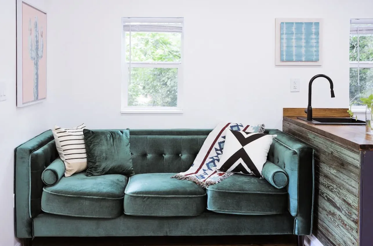 Inviting living area with accent walls and 32-inch Smart TV