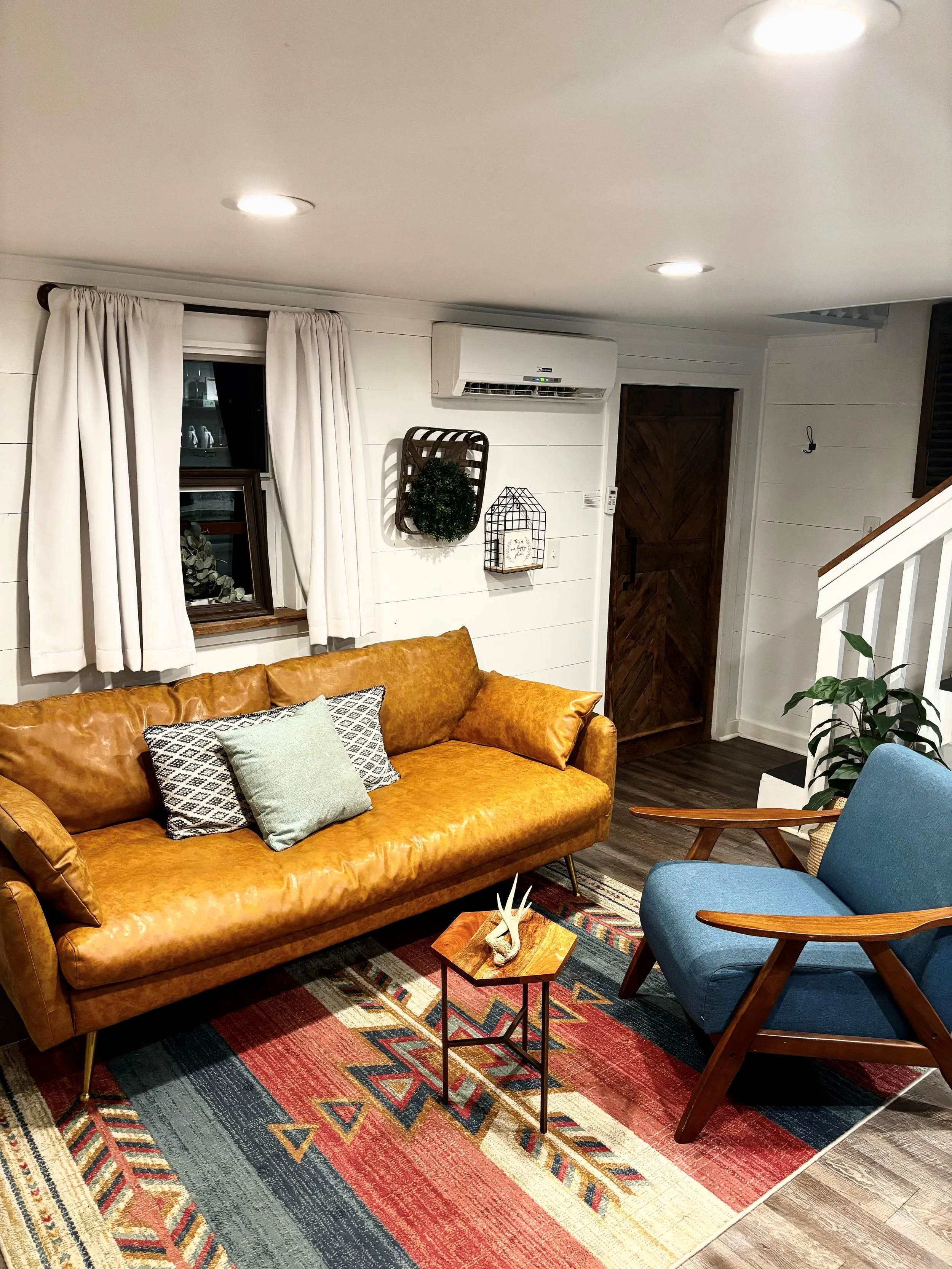 Bright modern interior with reclaimed wood and large windows