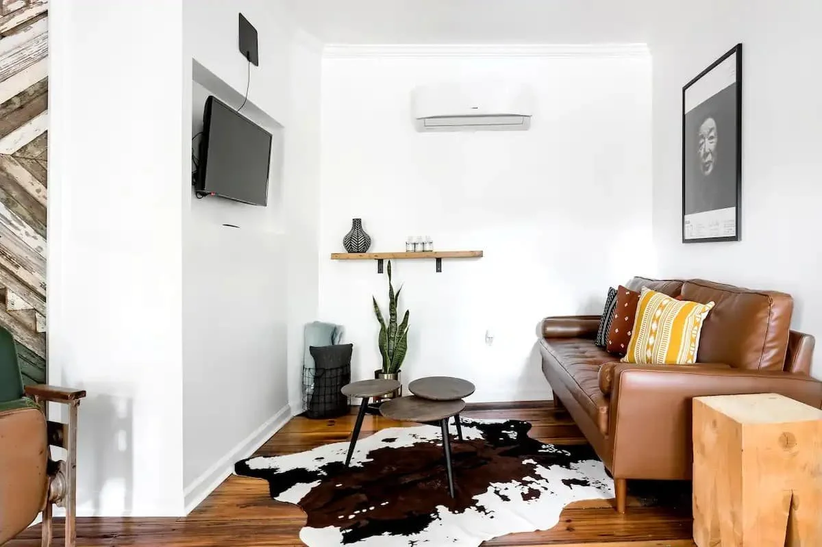 Bright living space with reclaimed wood accents and comfortable seating