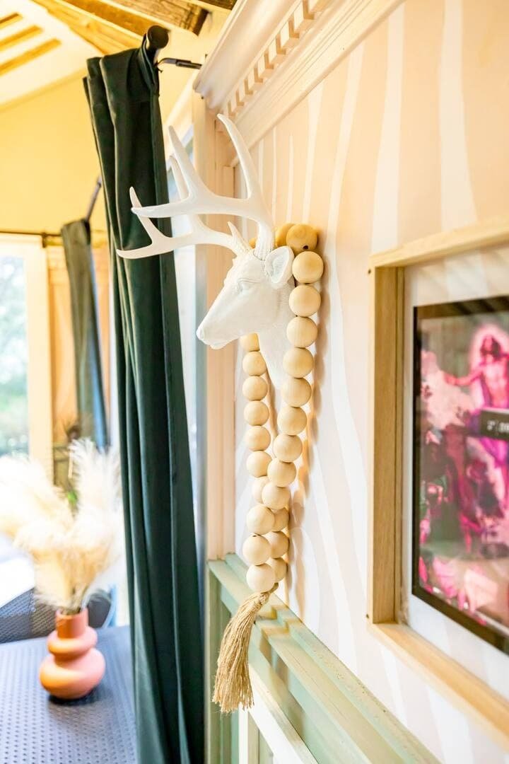 Creative decor and rustic-modern details inside the Tin & Juice Tree House