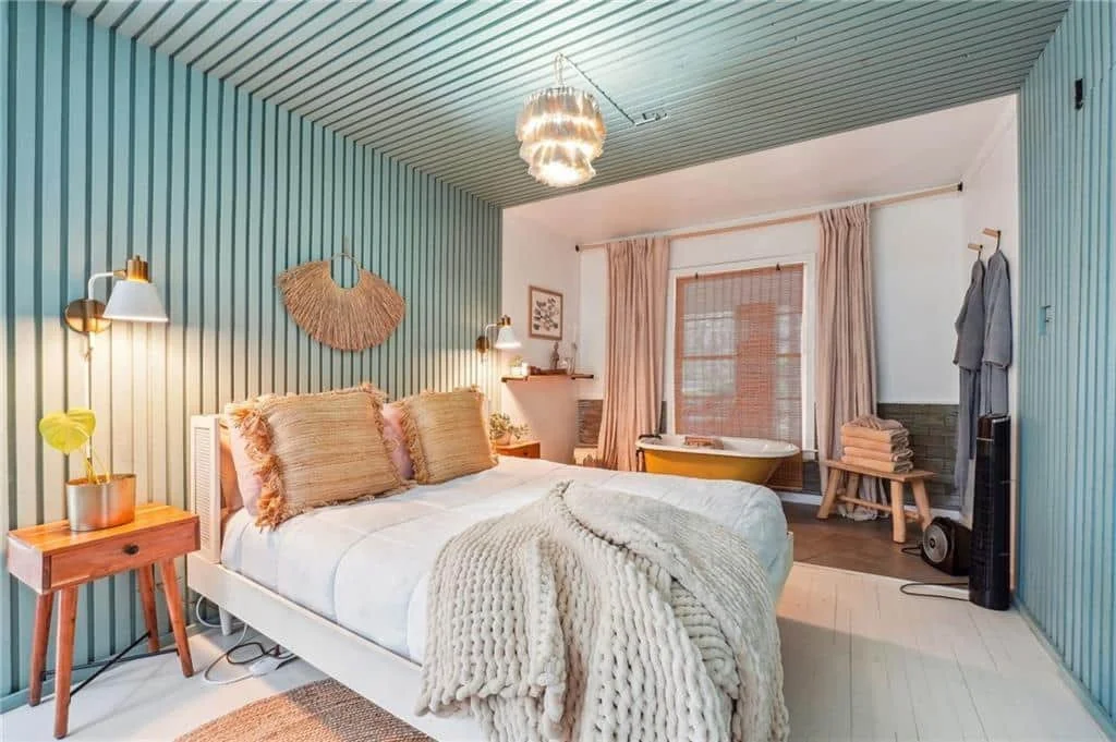 Queen bed in the Young Wild treehouse at Maxam East Point Atlanta