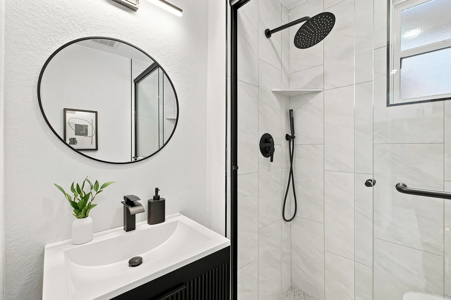 Updated bathroom with tile shower