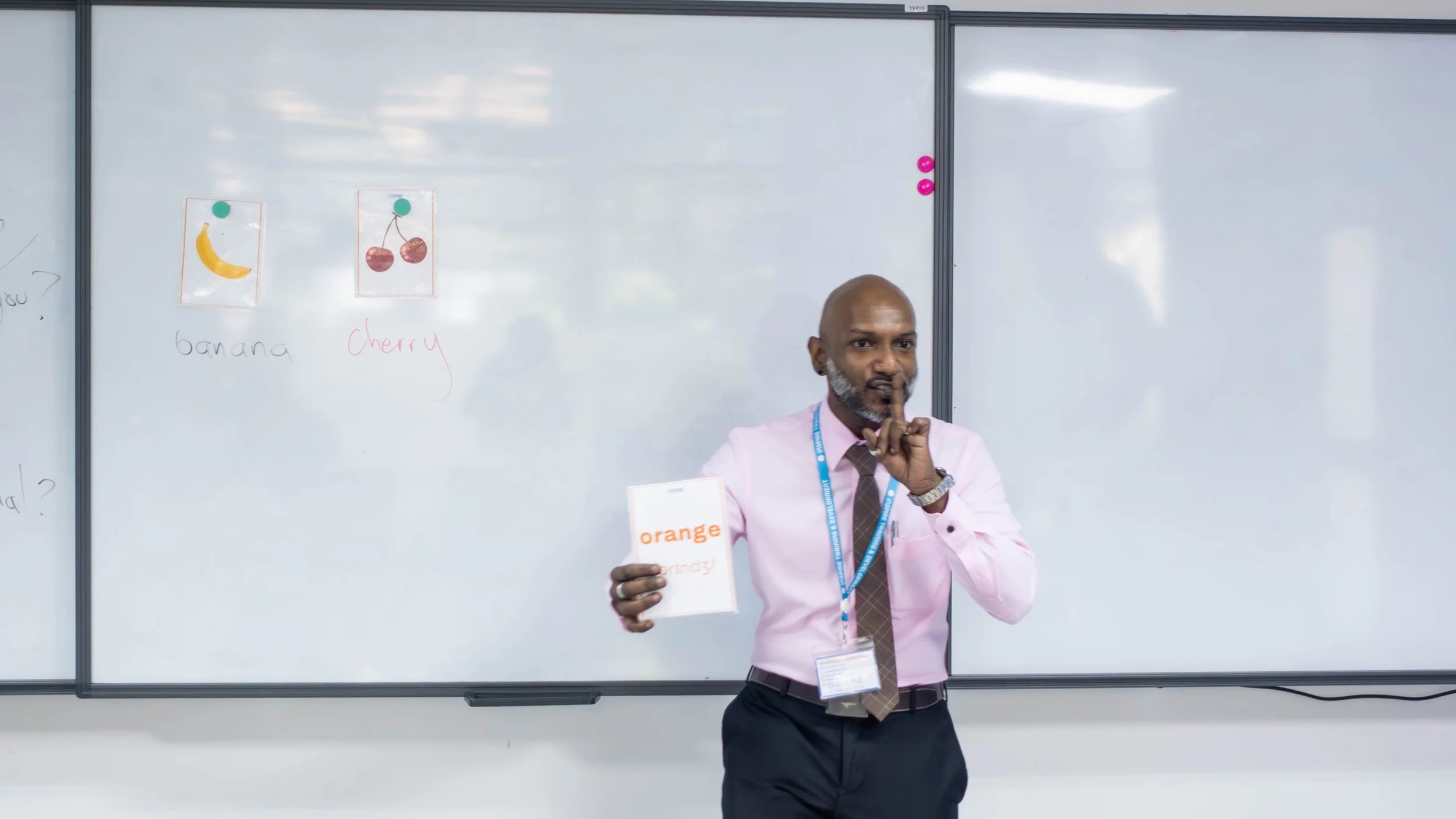 Teacher giving clear instructions to ESL students in class