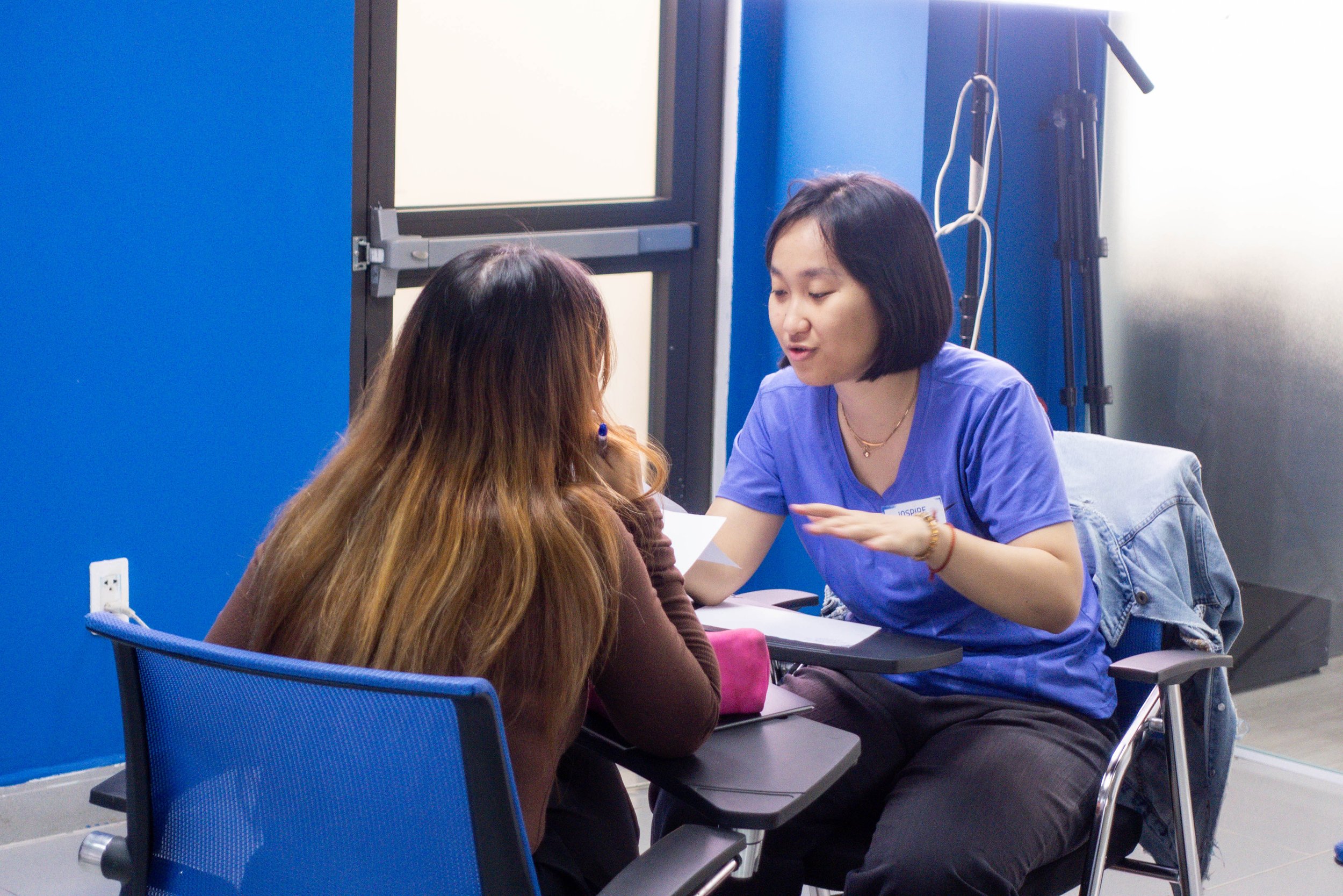 English teacher leading an interactive writing activity