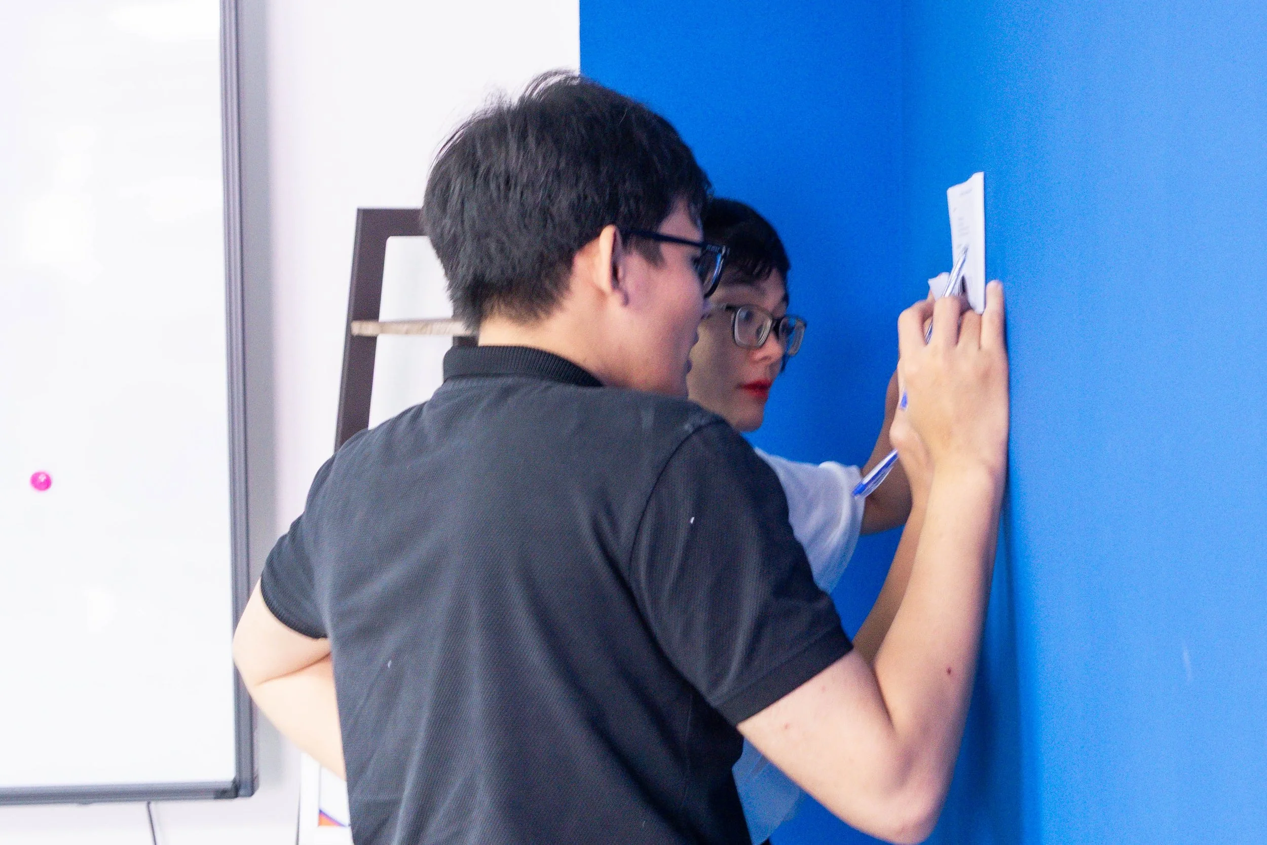 ESL students taking part in an interactive classroom activity