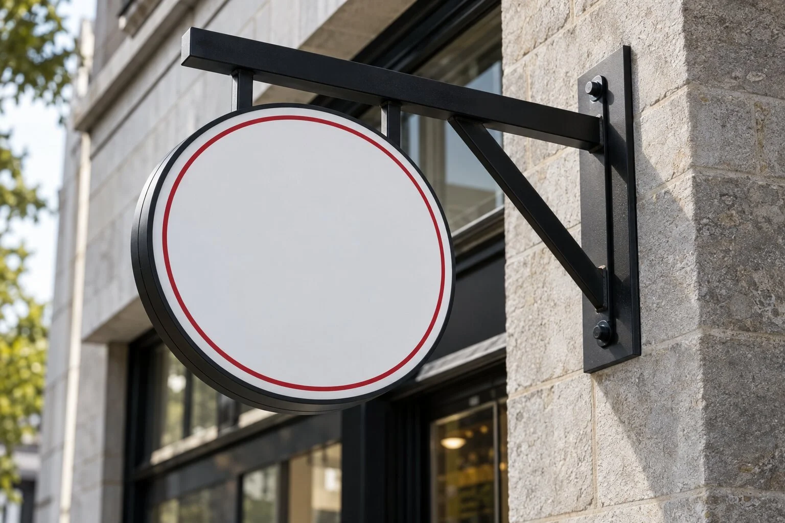 Close detail of a powder-coated blade sign bracket and mounting hardware