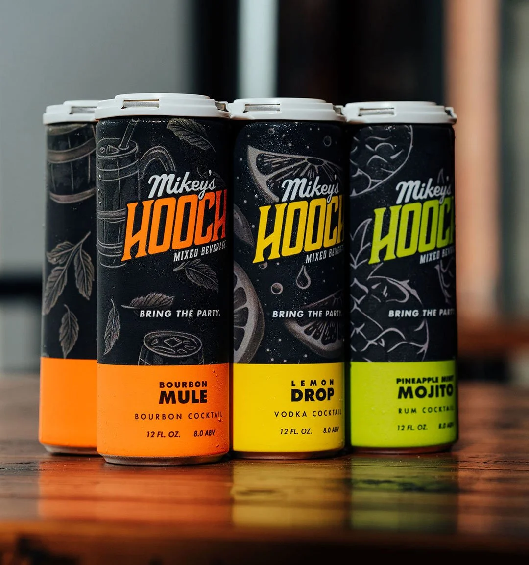 Mikey's Hooch cans and cocktails