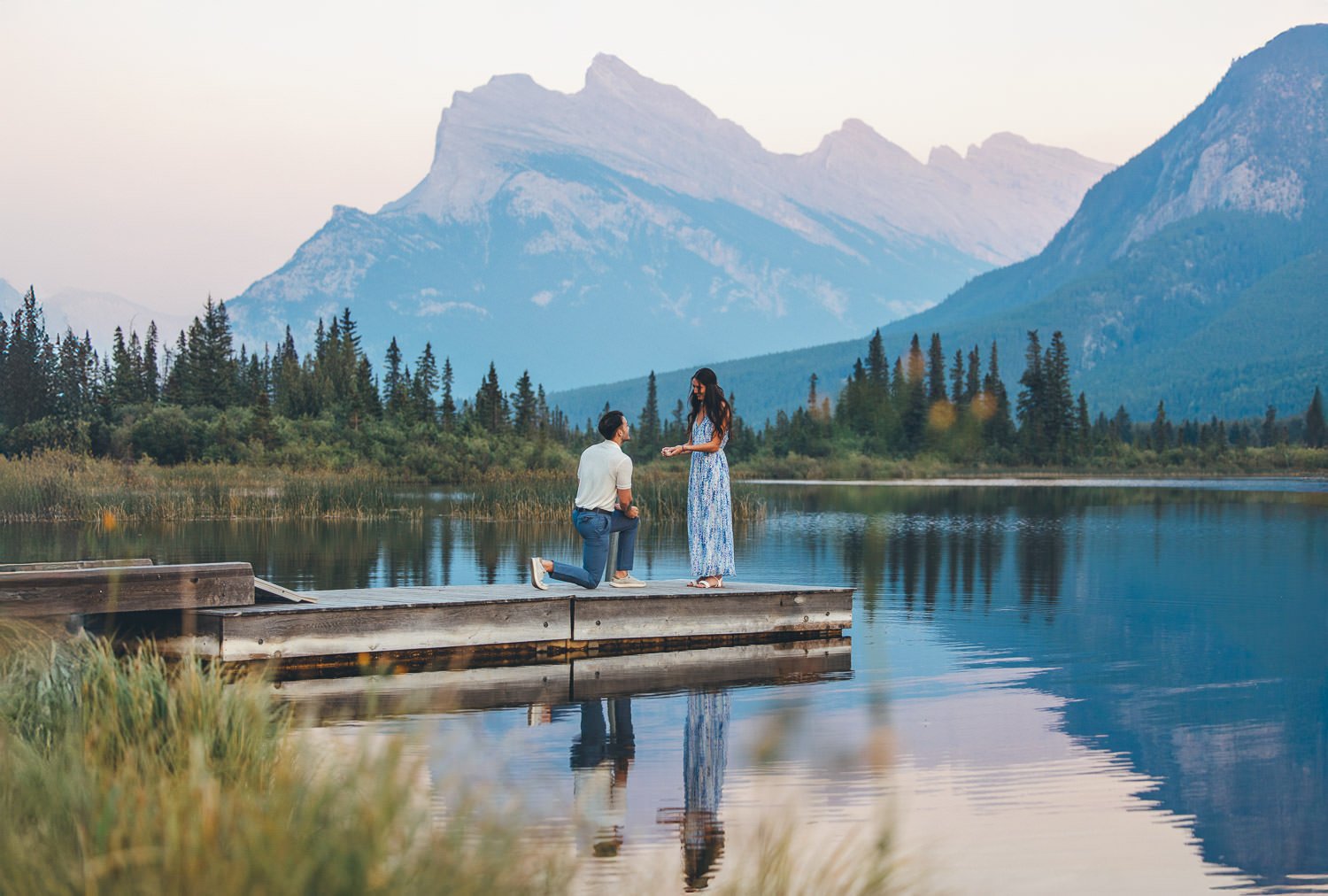 Vermillion Lake in summer, surrounded by greenery with calm, reflective waters.