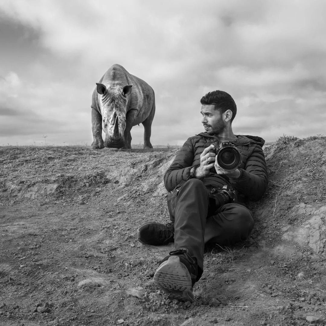Amish Chhagan, wildlife photographer and safari host, with a white rhino – Chags Photography by Amish Chhagan