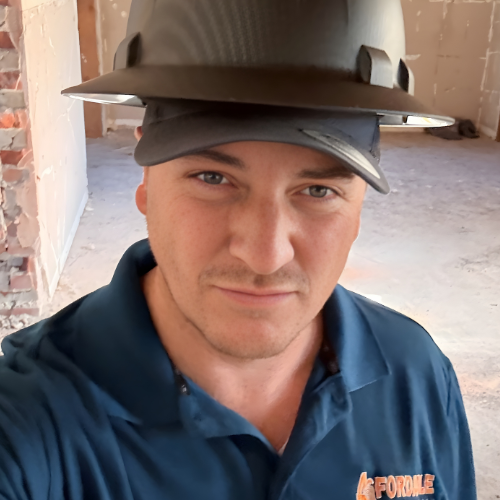 Matt King in a hard hat