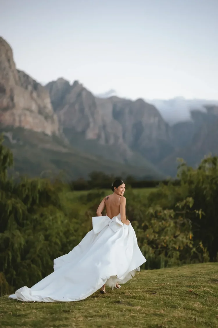 Editorial bridal portrait with the Cape mountains behind her