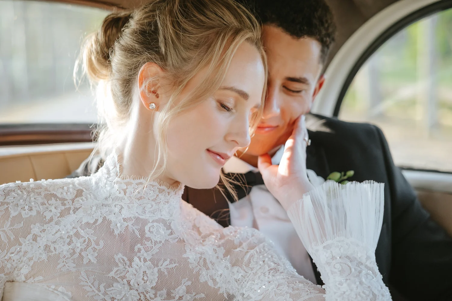 Bride and groom embracing on their wedding day