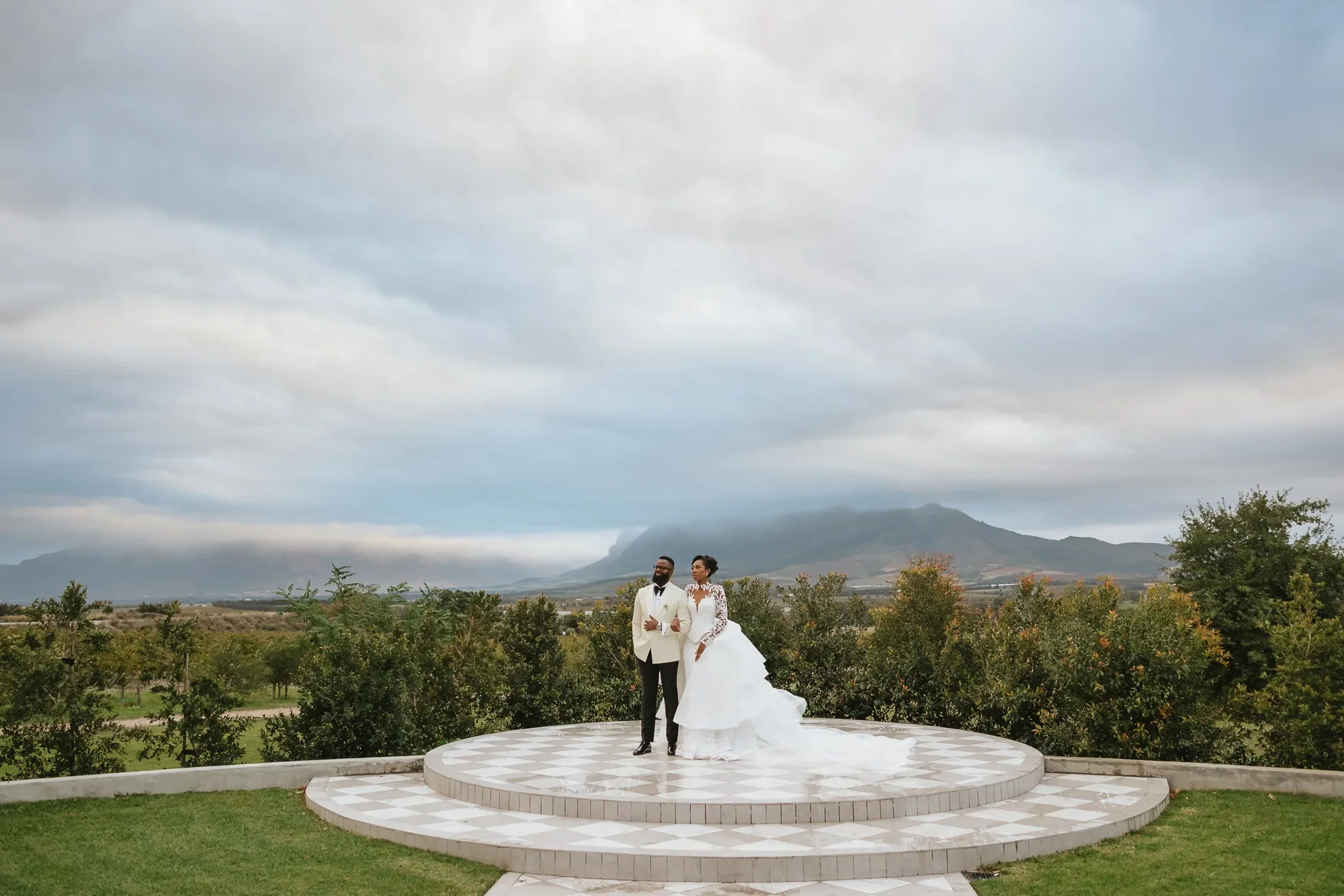 Wedding couple with mountain backdrop