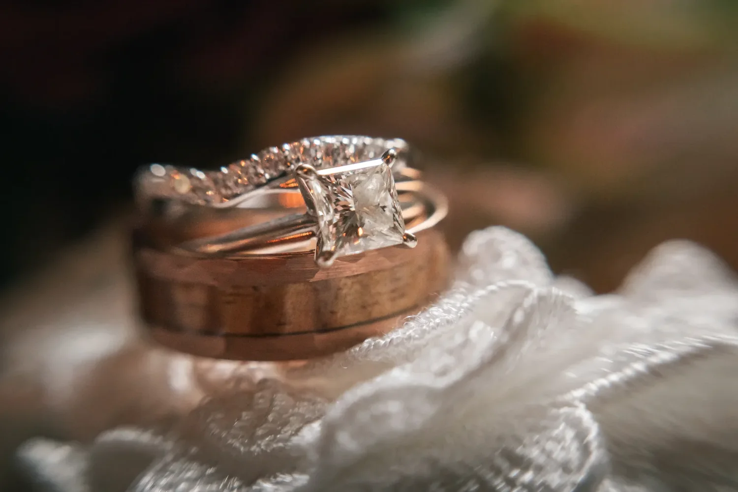 Wedding rings photographed on lace at Stoney Creek Castle