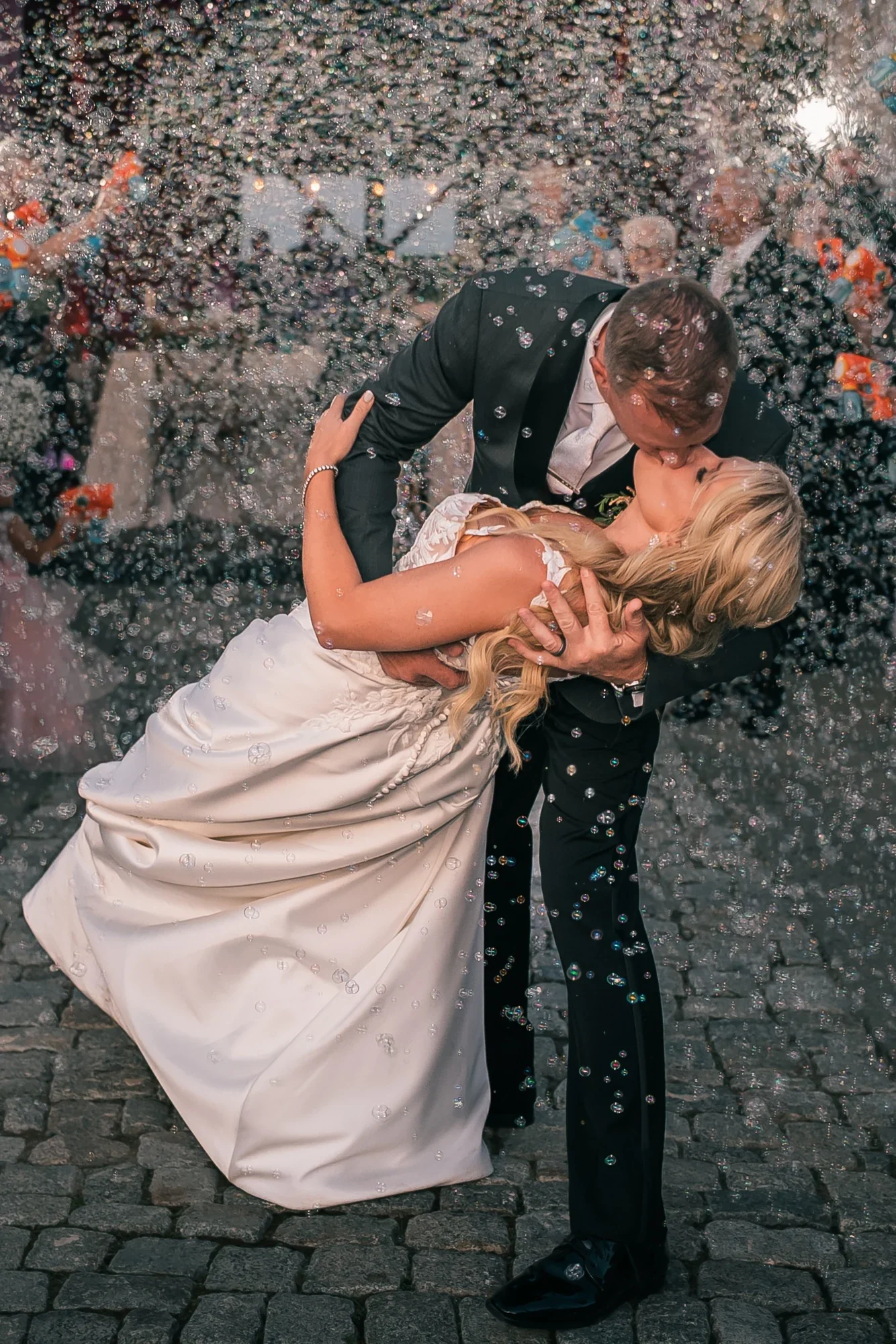 Bubble send off as the couple kiss on the stone path at LedgeRock.
