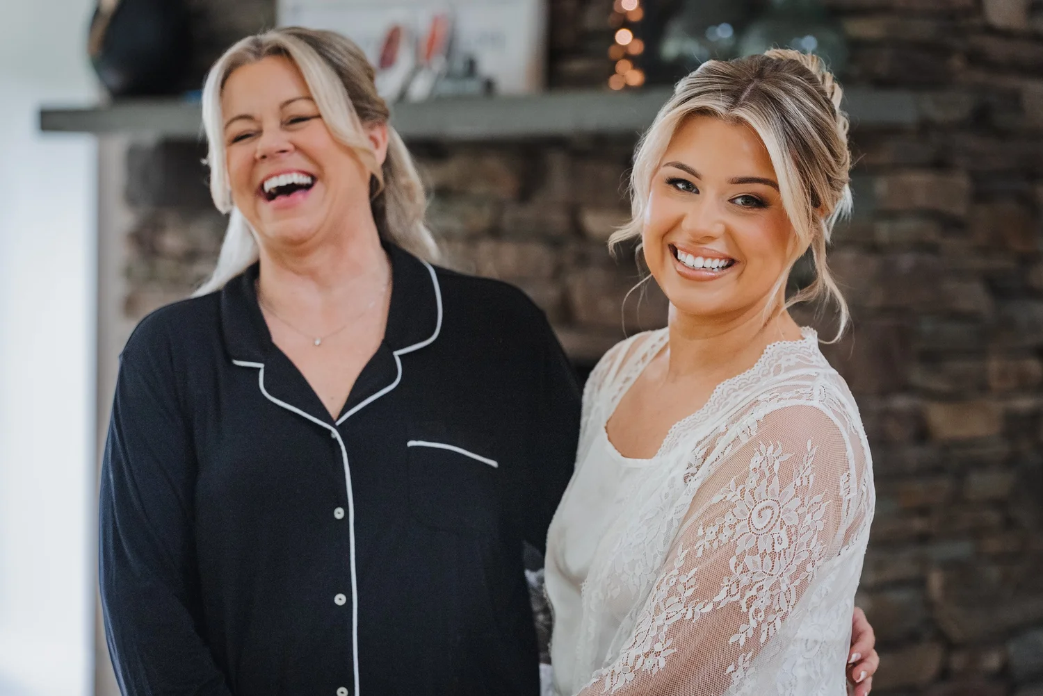 Bride sharing a candid moment inside the Stonewall Estate preparation space