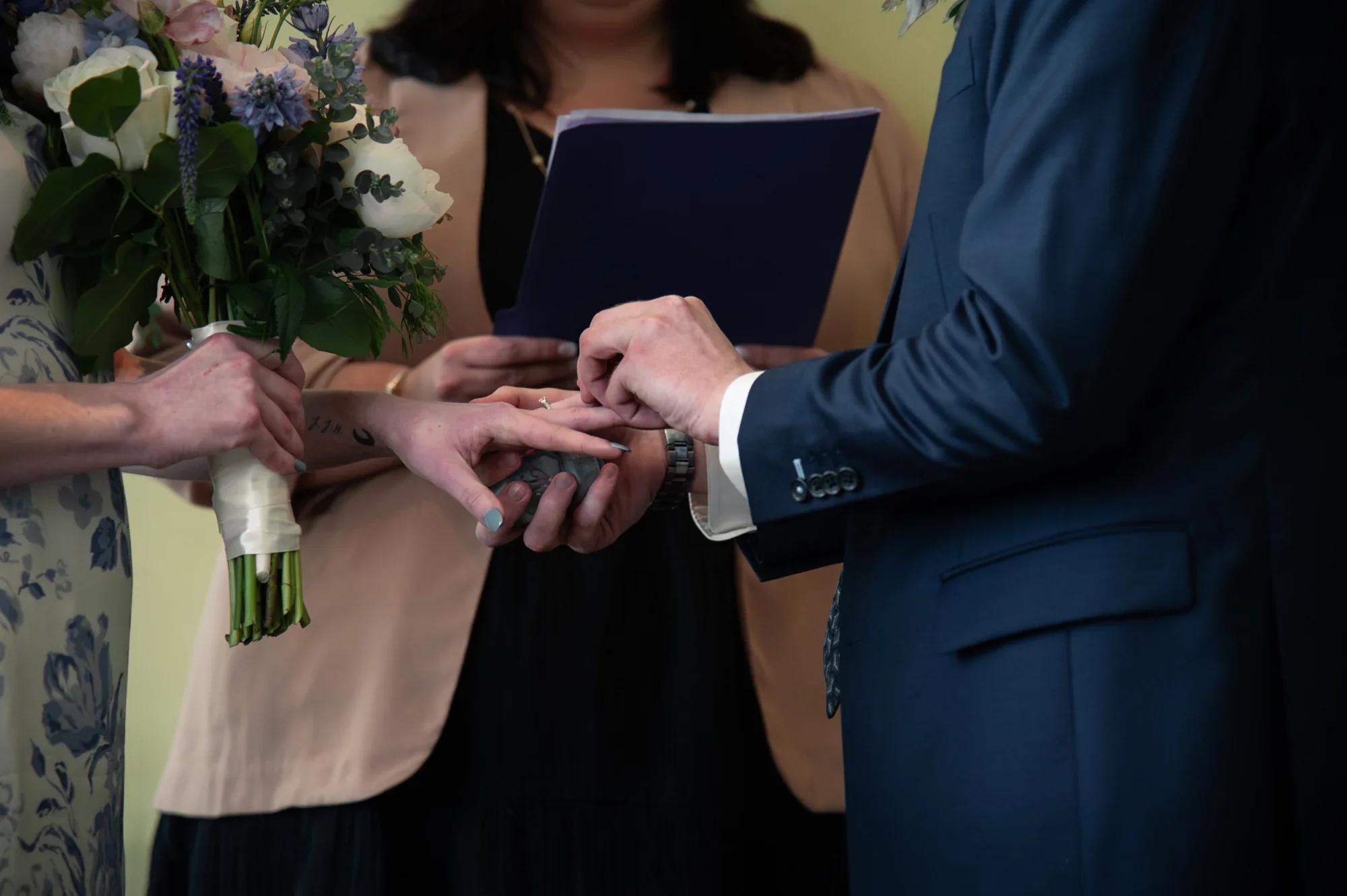 The ring exchange during Kealy and Jimmy’s ceremony at Remlik’s.