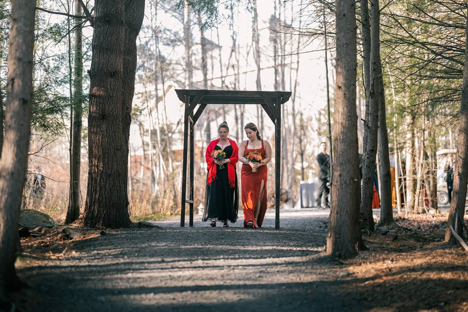 Wedding processional entering Windham Manor's Enchanted Forest ceremony site