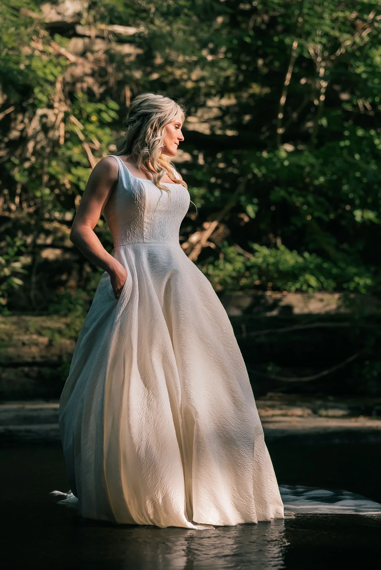 Bride in golden evening light at the LedgeRock waterfall.