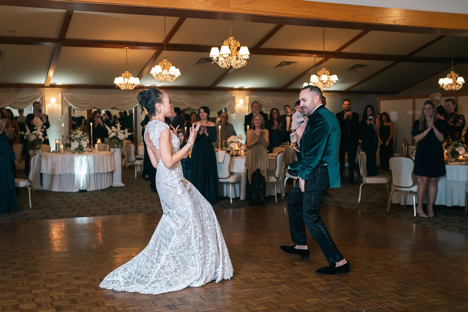 Shannon and Leon dancing it out on the parquet floor of the Castle Ballroom while guests watch from the edges