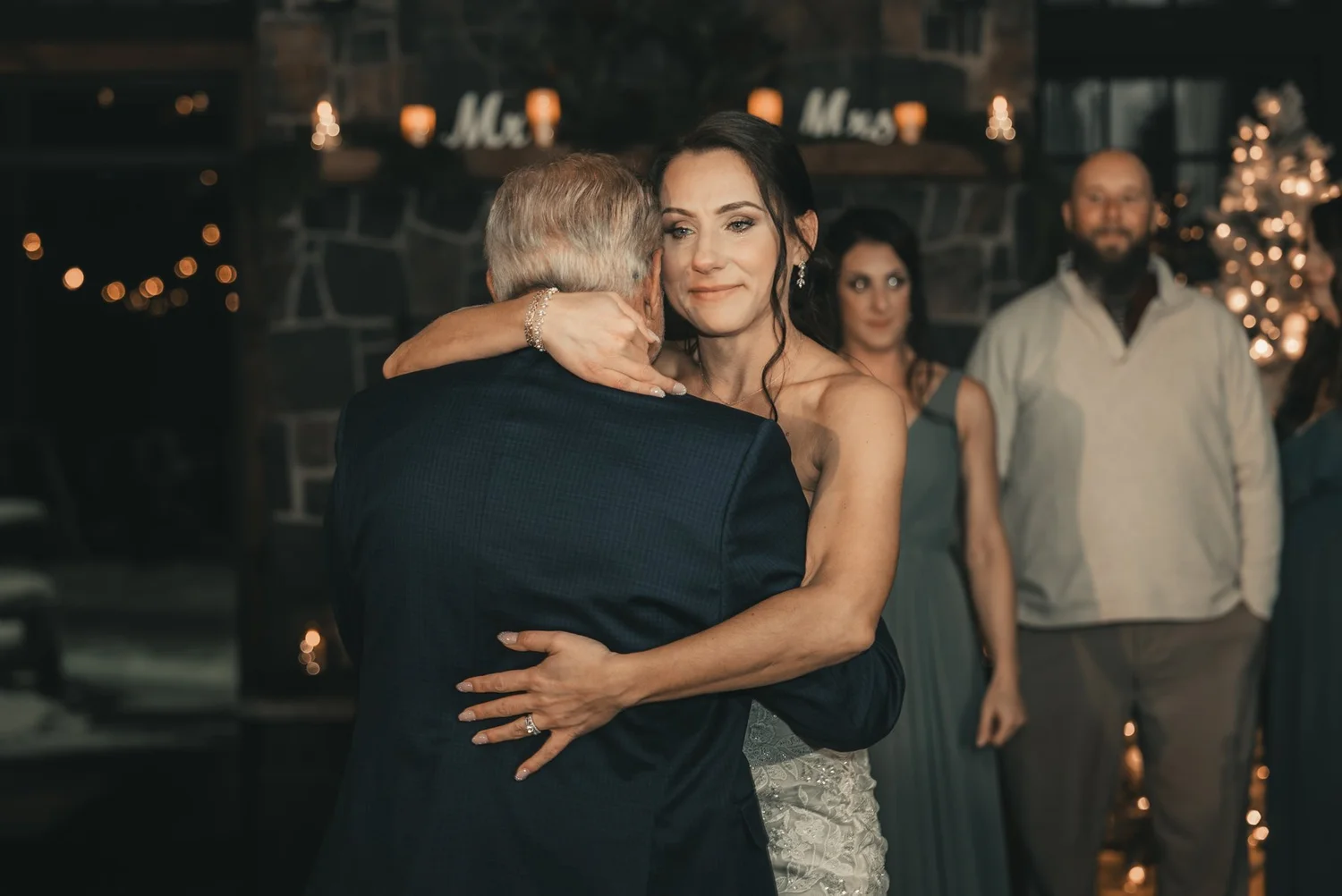 Jill embracing a guest during the evening reception at The Sinclair of Skaneateles