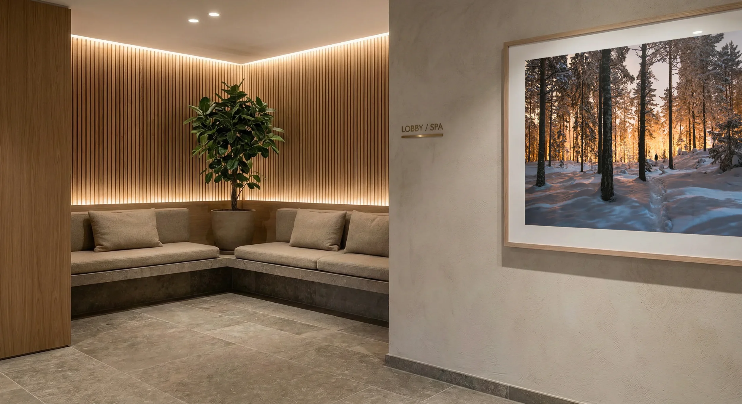 A large landscape photograph serving as a premium branding signal in a modern lobby