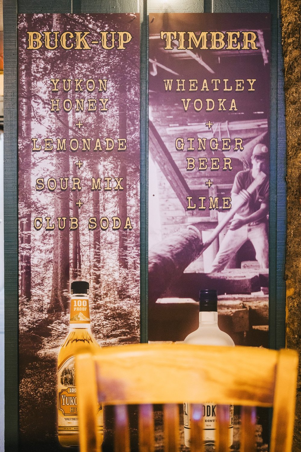 Buck-Up and Timber signature drink menu boards at The Sawmill in Tampa